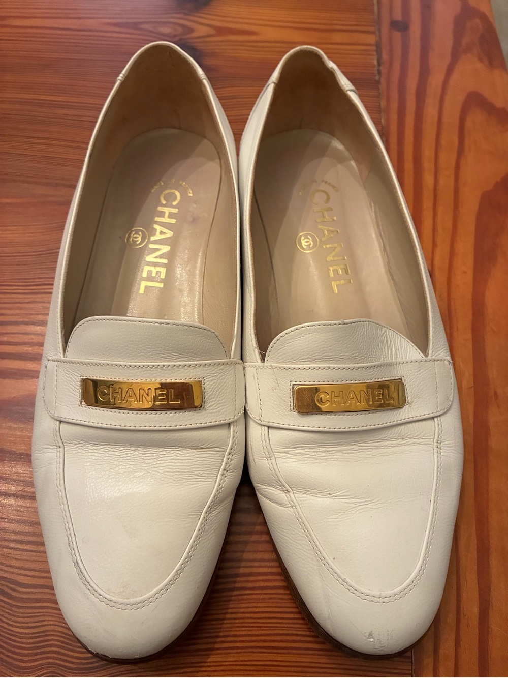 CHANEL Cream Leather Loafers with Gold Plaque